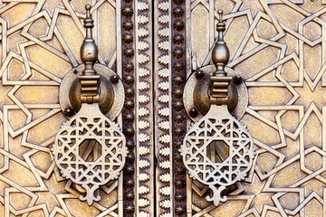 Ornates on old metal door