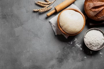  Baking and kneading background with ball of dough © mizina