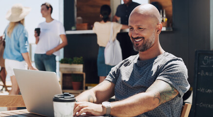 Smile, laptop and man at outdoor cafe for remote work, networking and relax in summer sun....