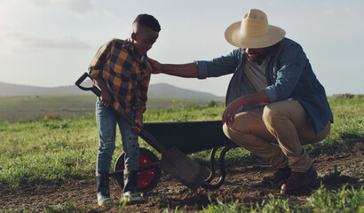 Farm, agriculture and father and kid help for farming, planting vegetables and dig in soil. Black...