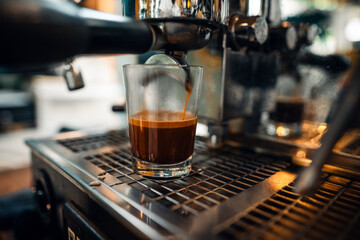 Expresso Coffee machine making a coffee,Fresh espresso shot pouring out of machine - obrazy, fototapety, plakaty
