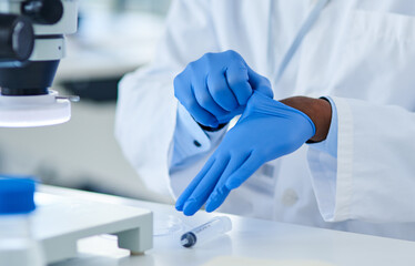 Gloves, hand and research in lab, scientist and medicine of periodic table, innovation and future...