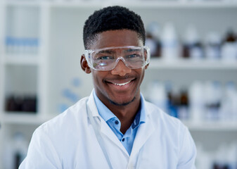 Science, portrait and black man with confidence, smile and glasses in laboratory for pharmaceutical...
