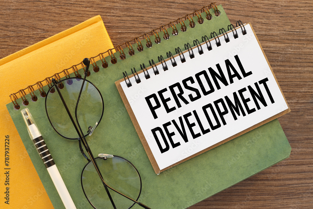 Aufkleber personal development yellow notepad and green notepad. text on page
