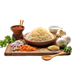 Rice cooking items and vegetables on a wooden table, cut out transparent