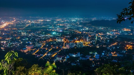 Fototapeta premium aerial view City night from the view point on top of mountain, Chiang mai,Thailand
