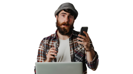 Handsome man with beard using laptop and mobile phone isolated on a transparent background