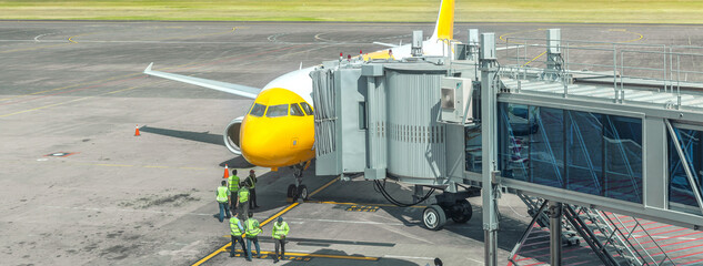 Preparation of a passenger aircraft by ground services at the airport.