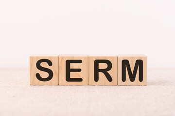 SERM word concept written on a light table and light background