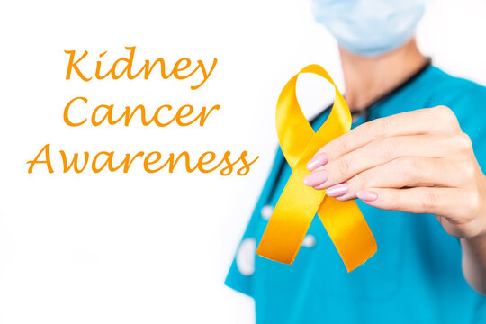 Female doctor with orange ribbon awareness in hand as stop sign for Kidney Cancer.