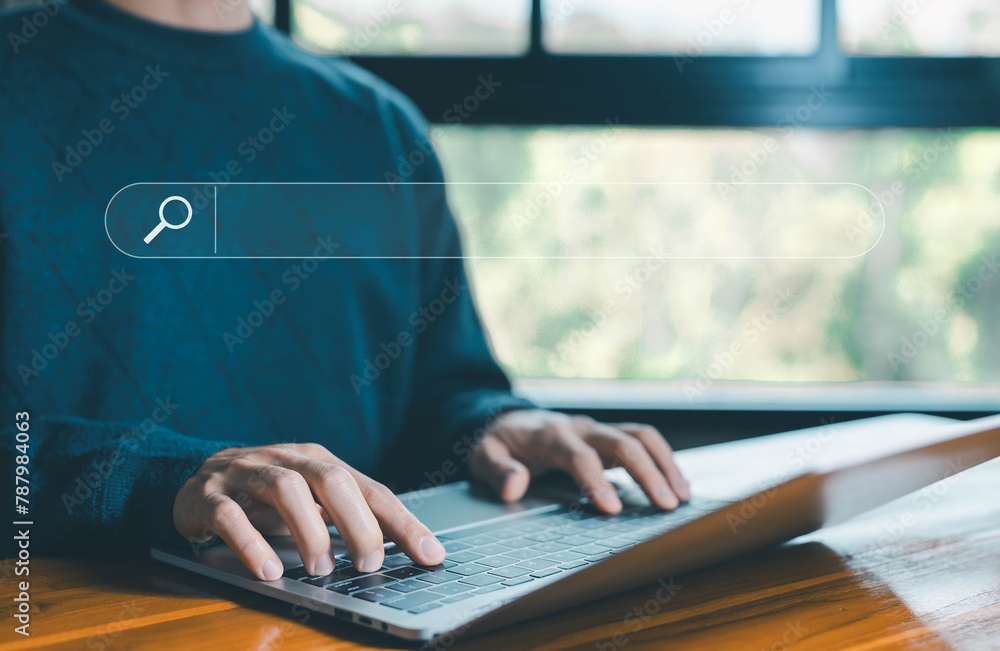 Poster man using a laptop shows a search bar. concept of web browser information, keyword search engines, s