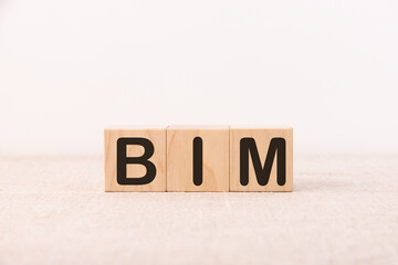 Word BIM is made of wooden building blocks. Concept.