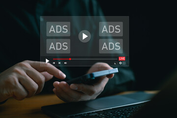 Man use smartphone with popup Video Ads on mobile phone, Digital marketing online advertising to...