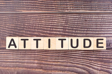 ATTITUDE word made with wood building blocks