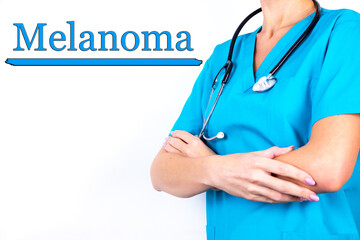 Diagnosis, the word MELANOMA is written on the background of a doctor in blue medical clothes. Medical concept.