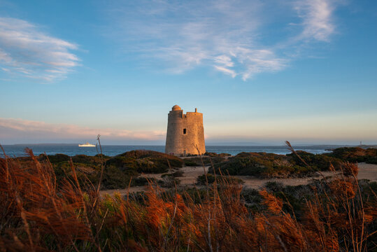 Torre de Ses Portes at sunset, Ses Salines natural park (Parque natural de ses Salines), Ibiza, Balearic Islands, Spain