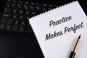 Practice Makes Perfect - written on a notebook with a pen.