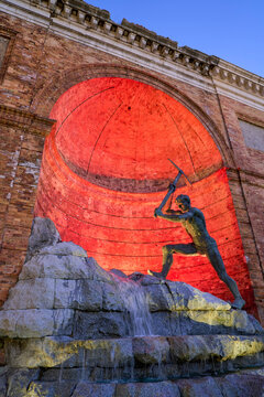 Vertical shot of the historic "Il Cavatore" statue in Catanzaro, Calabria, Italy