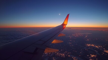 Airplane Wings: A photo of an airplane wing with the moon visible in the background