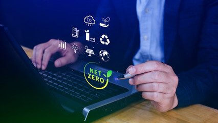 Net Zero and Carbon Neutral Concepts, Net zero greenhouse gas emissions target, Climate neutral long strategy, Businessman holding NetZero icon.
