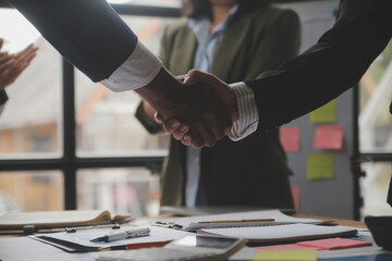 Meeting and greeting concept, Two confident Business handshake and business people after discussing good deal of Trading contract and new projects for both companies, success, partnership, co worker. - obrazy, fototapety, plakaty
