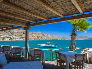 View from a seaside restaurant (Elounda, Crete, Greece) - obrazy, fototapety, plakaty