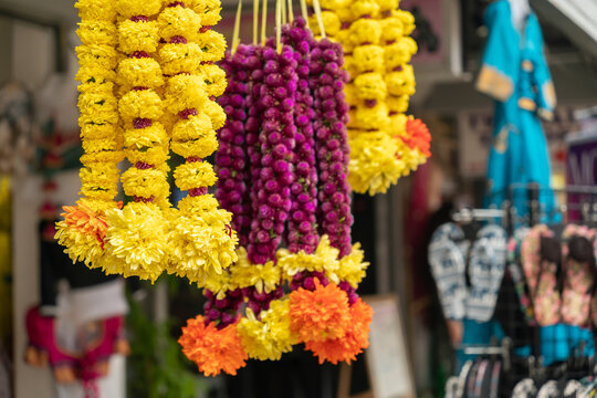 Close-up view of the colorful garlands for sale at the Little India Brickfields.