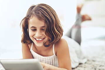 Young girl, happiness and tablet in apartment for online streaming, games and watching videos....