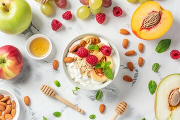 Healthy fruit and yogurt bowl with various toppings on white background top view