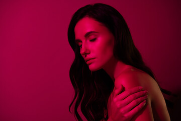 Obraz premium Photo of girl touch skin body feel tenderness close eyes isolated pink color background