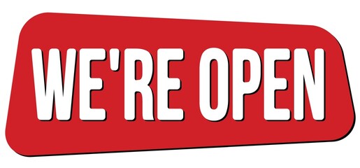 WE'RE OPEN text on red trapeze stamp sign.