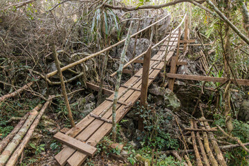 Rickety bridge on a trail to Phanoi viewpoint above Muang Ngoi Neua village, Laos