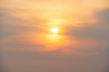 Evening sky time with sun and orange clouds in sunset sky background.Heatwave hot sun., climate...
