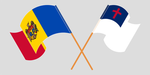 Crossed and waving flags of Moldova and christianity