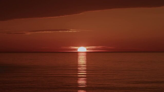 Water Ripple Background Texture. Sunlight Reflect On Water Surface. Orange Sea At Sunset.