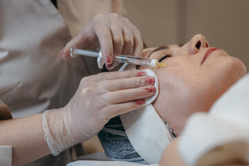 Facial injection in a beauty salon	
