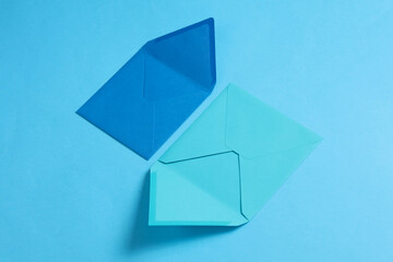 Set of blue tones envelopes on blue  background.