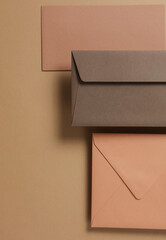 Set of floating envelopes and cards on beige background. Invitations, corporate identification....