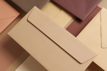 Set of floating envelopes and cards on beige background. Invitations, corporate identification....