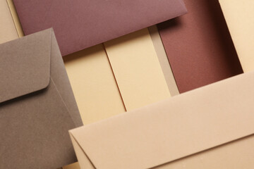 Set of floating envelopes and cards on beige background. Invitations, corporate identification. Creative layout