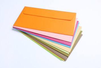 Set of colored envelopes on a white background