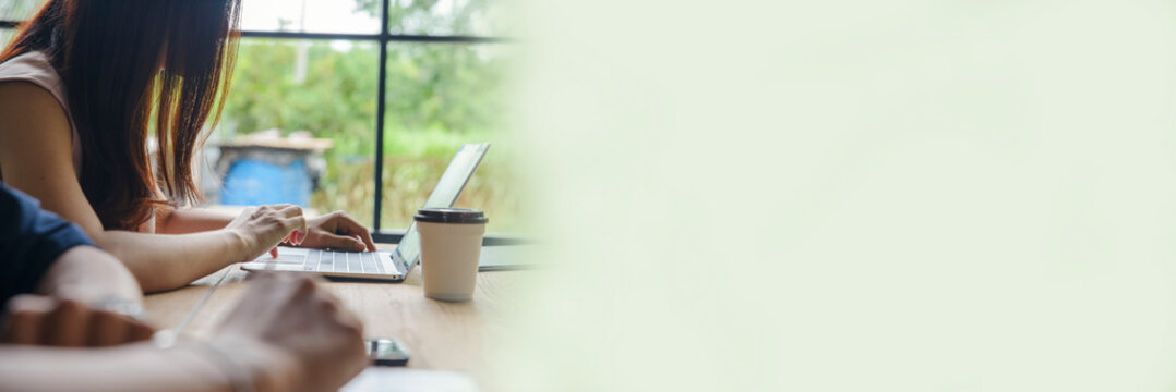 Asian businesswoman checking and planning financial data. Professional Accountant review and checklist annual report,summary report and paper on office desk. Business woman and planner concept-Banner