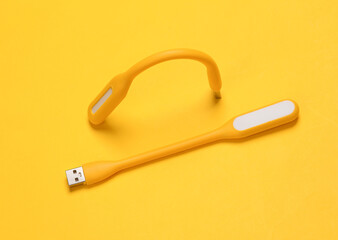 Flexible USB lamps on yellow background