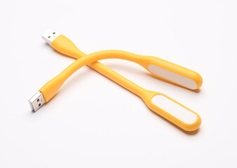Flexible USB lamps on yellow background.