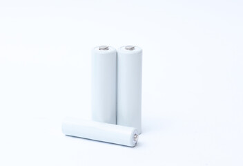 White blank aa and aaa batteries on a white background. Mockup for design