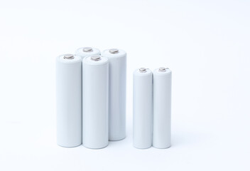 White blank aa and aaa batteries on a white background. Mockup for design