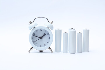 Alarm clock with AA and AAA batteries on a white background