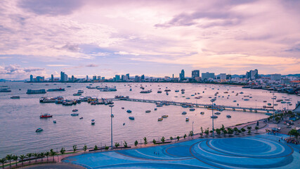 Aerial view of Pattaya city in the morning. Image consist of many boats in the ocean and community...