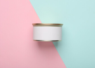 Cans with canned food on pink blue background. Blank label, mockup for design