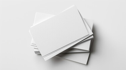 A stack white blank business cards isolated on white background - obrazy, fototapety, plakaty